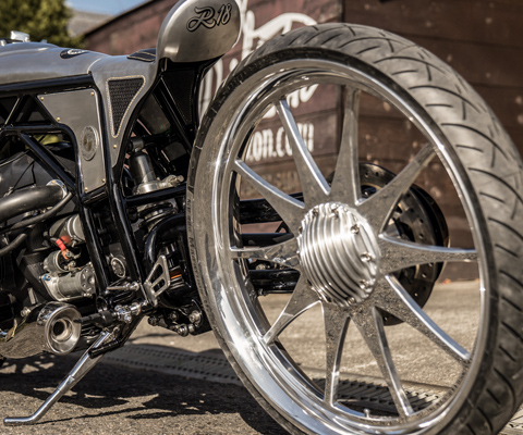 Perspective with rear wheel and rear section in focus from below